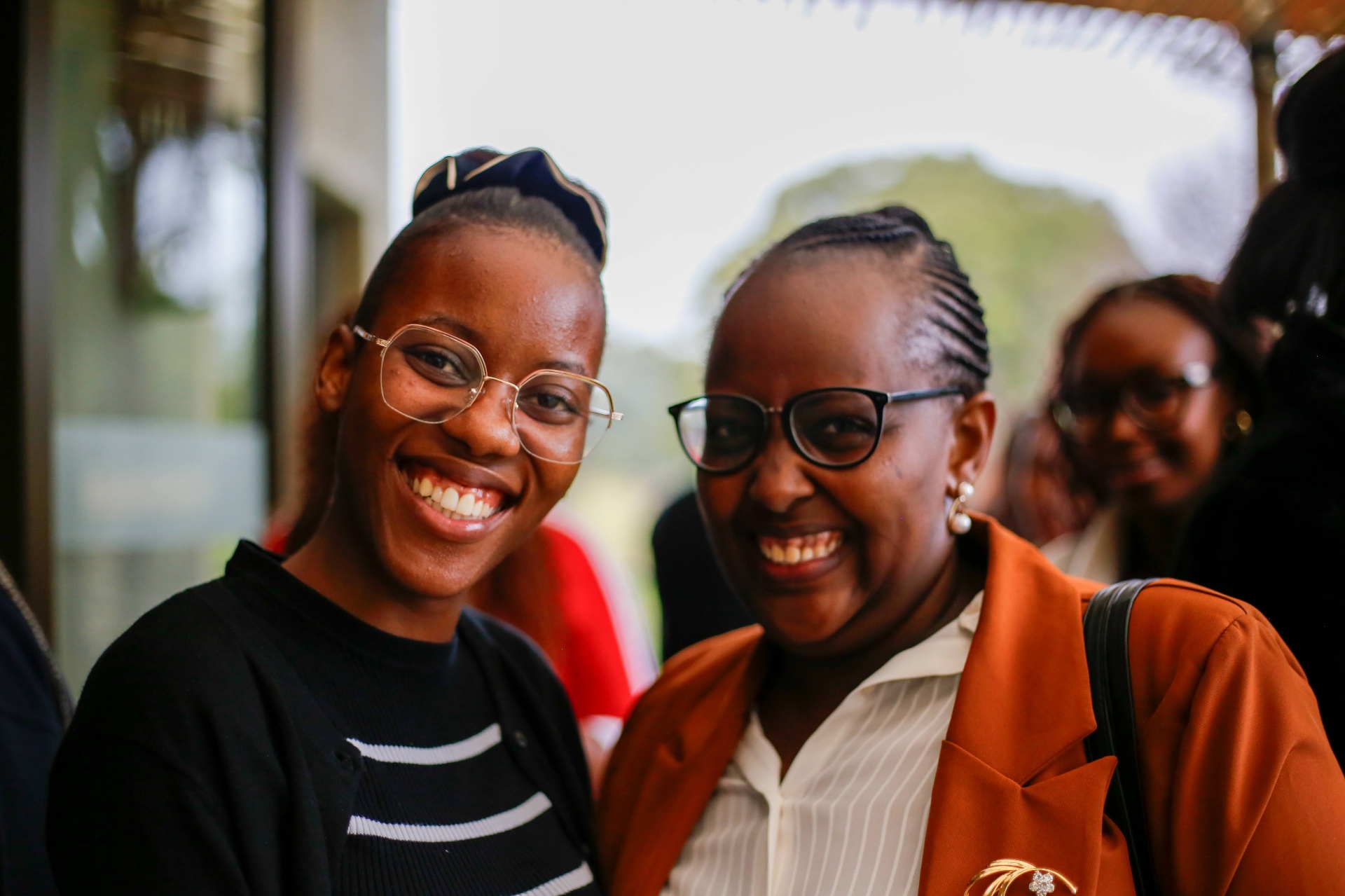REIGN Church members smiling and connecting after the Sunday service