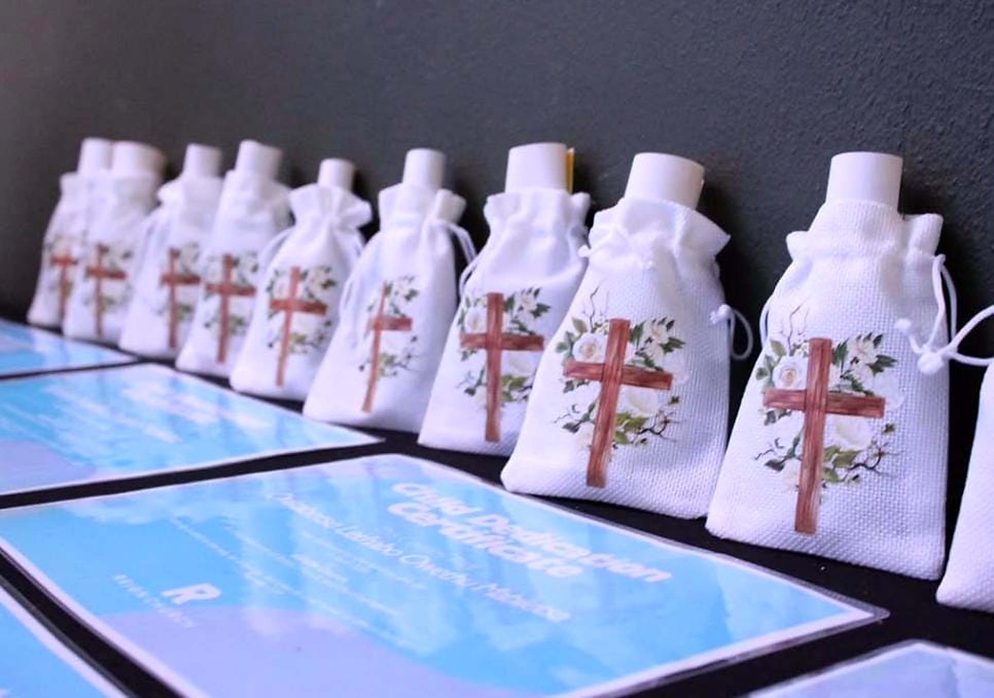 Personalised REIGN Church child dedication certificates and keepsake gift bags