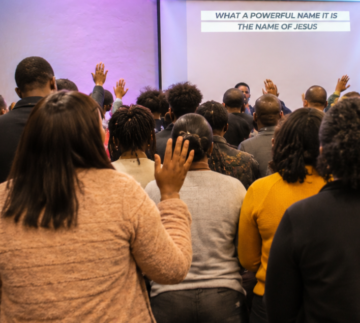 REIGN Church worship team lifting up the powerful name of Jesus